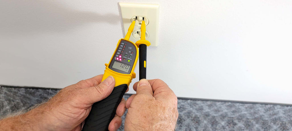 Digital Voltage Meter being used on a typical home outlet